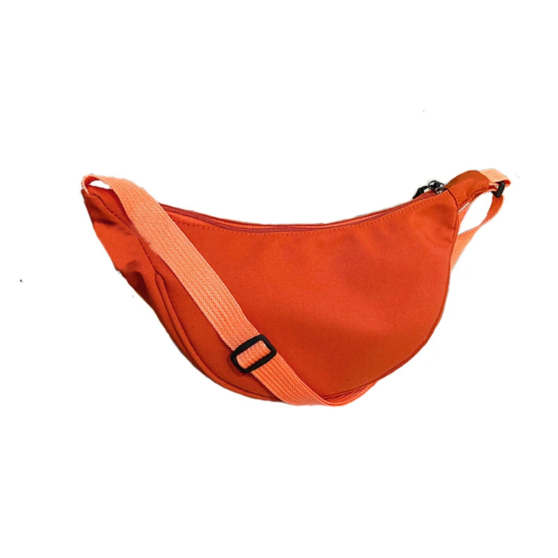 Women's bag - A round-shaped nylon bag with a cross-body strap, suitable for traveling, going to school or shopping.